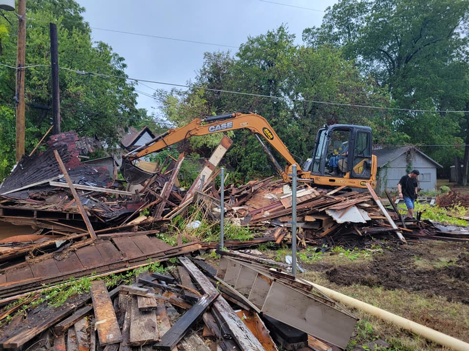 Storm-damaged structure demolition near Rowlett, TX, from roof and structural damage that led to water intrusion